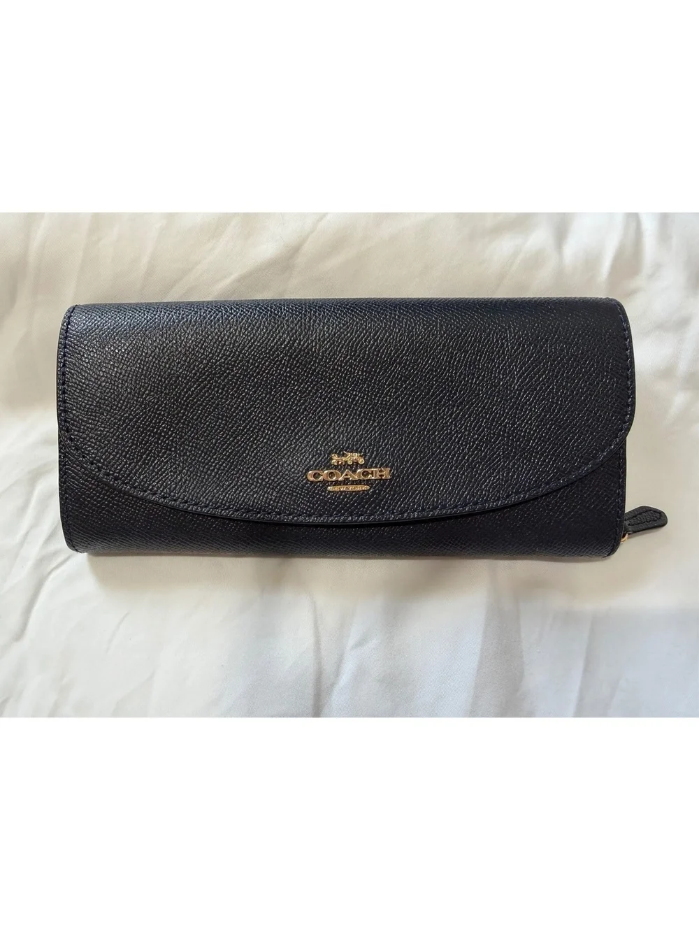 Coach Navy Leather Wallet with Multiple Card Slots and Zippered Compartments